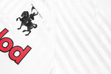 DAXUEN white long-sleeve polo shirt with bold wordmark and shield graphic