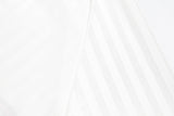 DAXUEN white long-sleeve polo shirt with bold wordmark and shield graphic