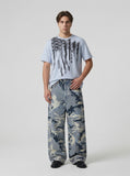 DAXUEN Crew neck graphic T-shirt with abstract flag print — model photo