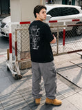 DAXUEN white oversized tulip outline graphic tee — model photo