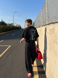 DAXUEN white oversized tulip outline graphic tee — model photo