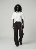 DAXUEN Boxy short-sleeve polo shirt with houndstooth collar — model photo