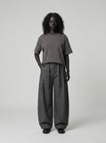 DAXUEN Boxy striped short-sleeve T-shirt with raw edges — model photo