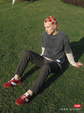 DAXUEN bright red suede minimalist sneakers — model photo