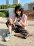 DAXUEN brown plaid high-waisted culottes — model photo