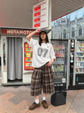 DAXUEN brown plaid high-waisted culottes — model photo