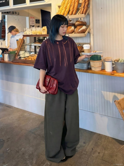 DAXUEN black oversized brushstroke print t-shirt — model photo