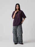 DAXUEN black oversized brushstroke print t-shirt — model photo