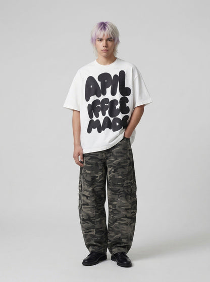 DAXUEN Oversized graphic T-shirt with playful print — model photo
