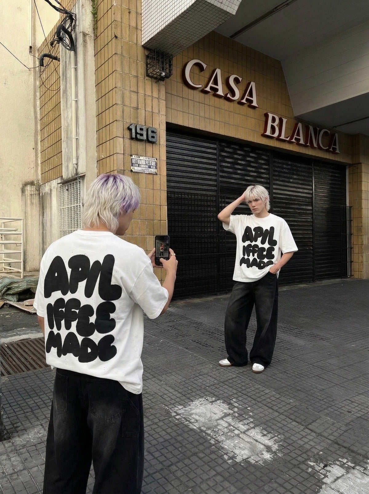 DAXUEN Oversized graphic T-shirt with playful print — model photo