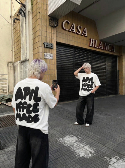 DAXUEN Oversized graphic T-shirt with playful print — model photo