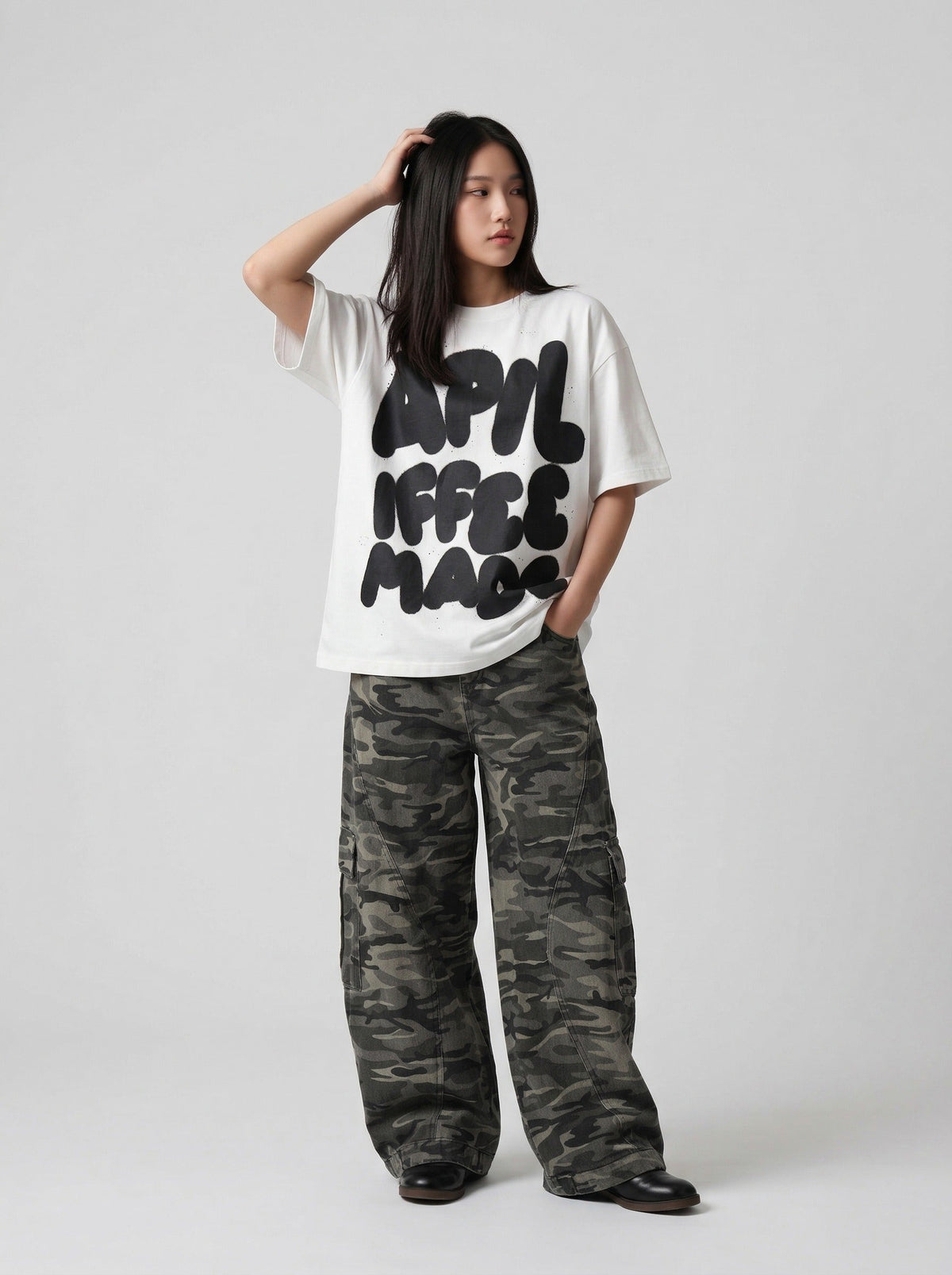 DAXUEN Oversized graphic T-shirt with playful print — model photo