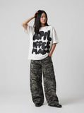 DAXUEN Oversized graphic T-shirt with playful print — model photo