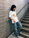 DAXUEN Oversized Sketch Dog Graphic Tee — model photo