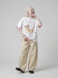 DAXUEN Oversized Sketch Dog Graphic Tee — model photo