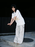 DAXUEN Oversized Sketch Dog Graphic Tee — model photo