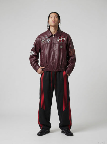 DAXUEN burgundy bomber jacket with beetle club patches — model photo