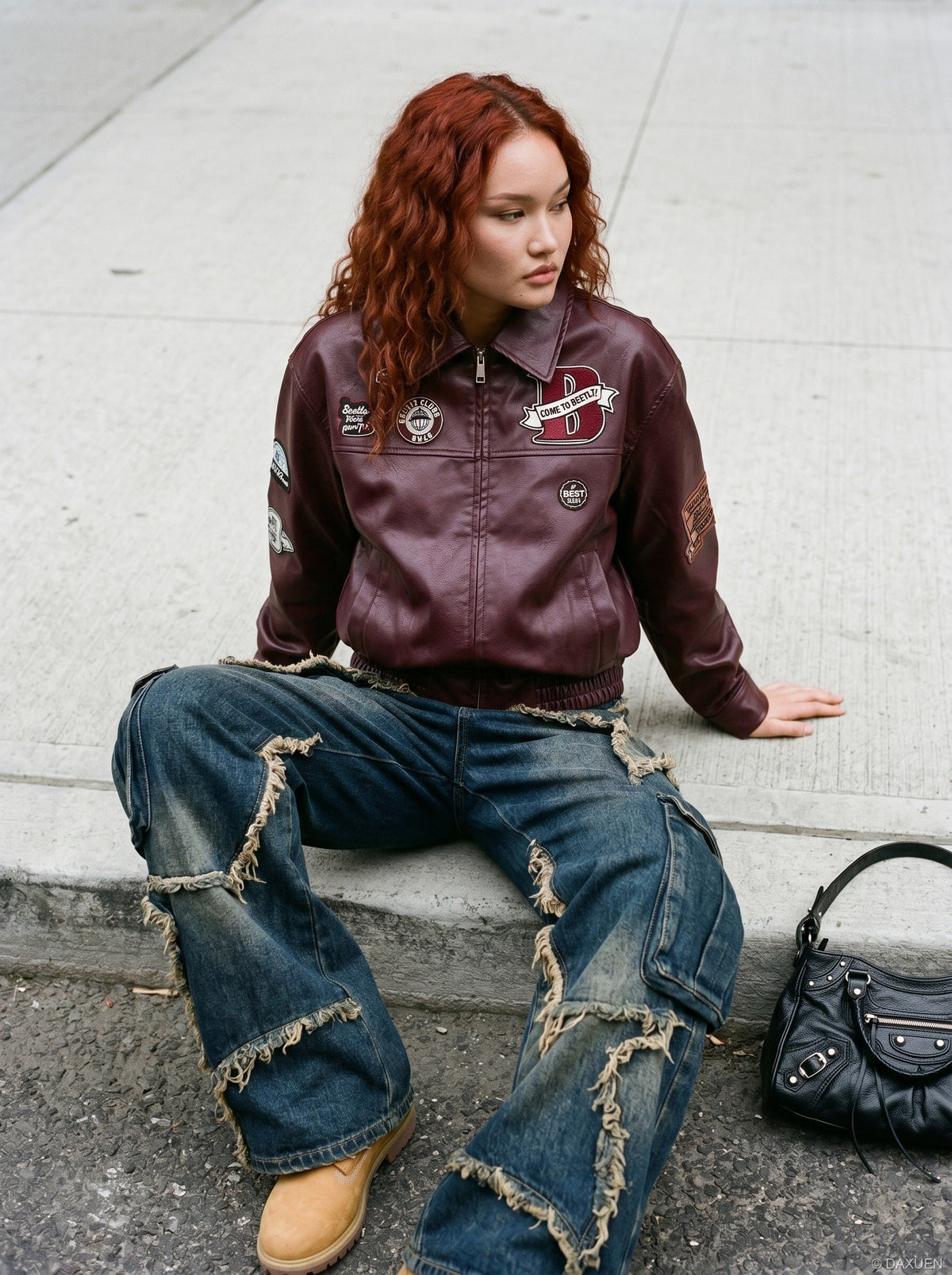 DAXUEN burgundy bomber jacket with beetle club patches — model photo