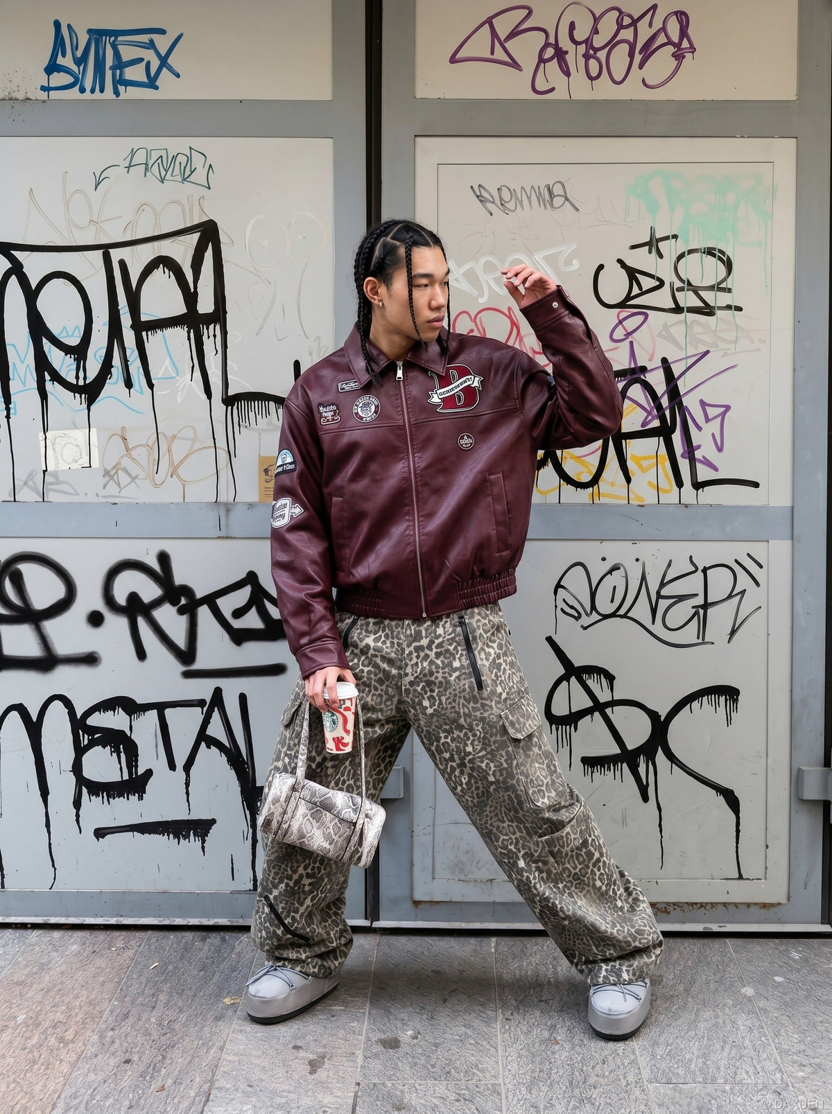 DAXUEN burgundy bomber jacket with beetle club patches — model photo