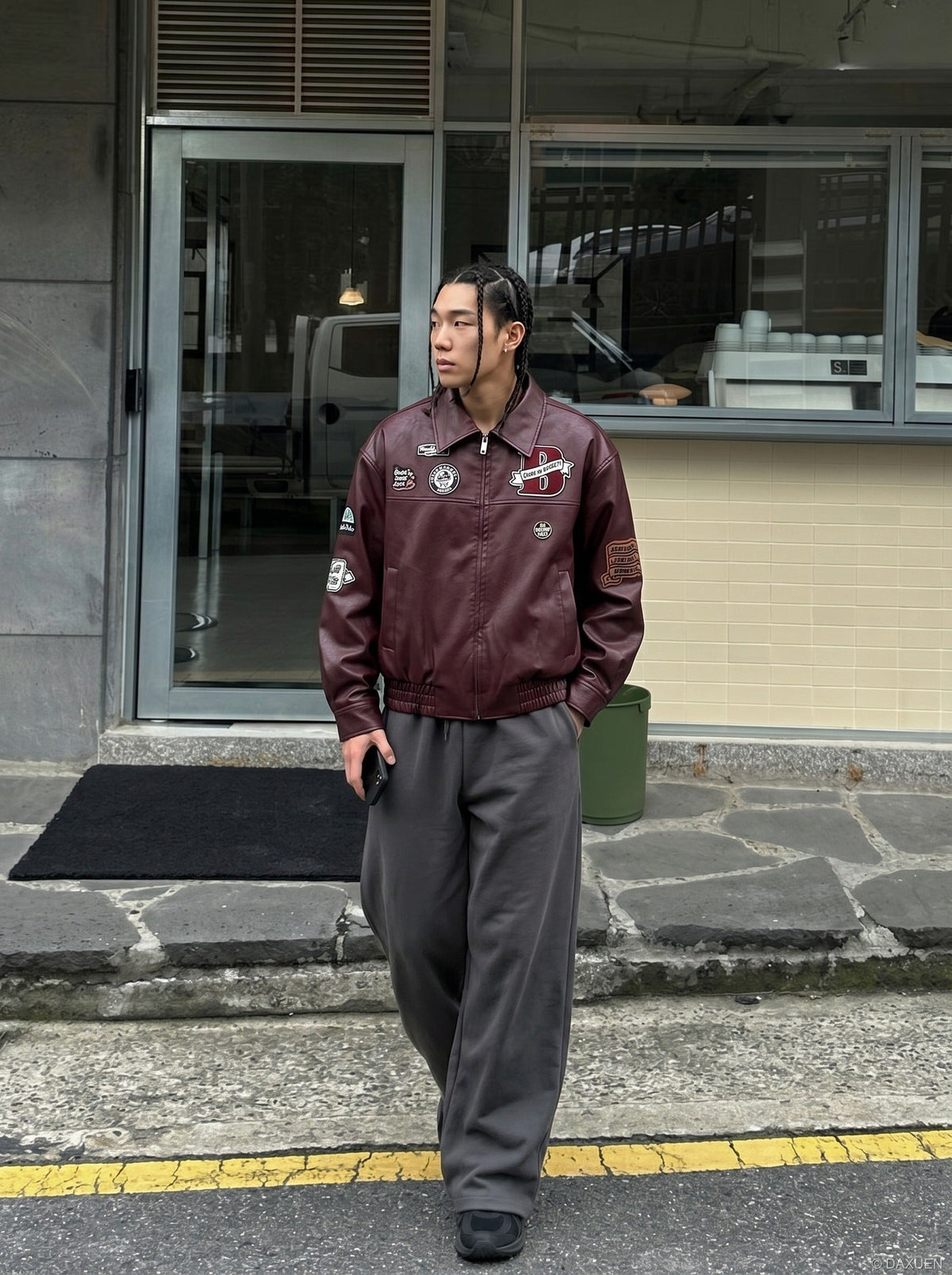 DAXUEN burgundy bomber jacket with beetle club patches — model photo