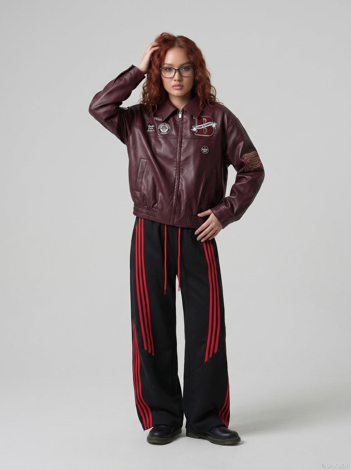 DAXUEN burgundy bomber jacket with beetle club patches — model photo