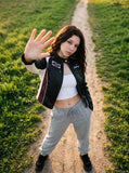 DAXUEN black cropped burgundy-blocked racer faux leather jacket — model photo