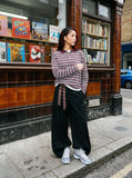 DAXUEN burgundy striped knit long-sleeve polo shirt — model photo