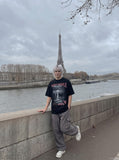 DAXUEN Oversized short-sleeved graphic T-shirt with urban print — model photo