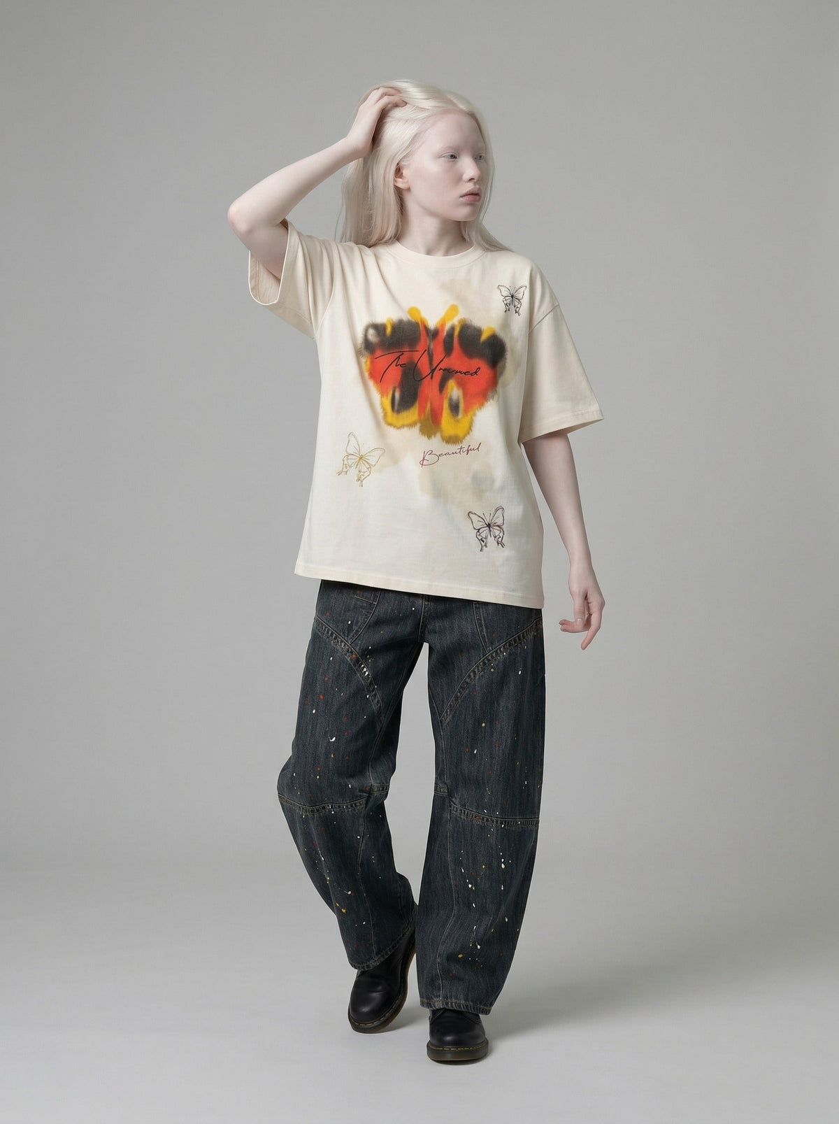 DAXUEN Butterfly graphic crew neck t-shirt — model photo