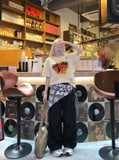 DAXUEN Butterfly graphic crew neck t-shirt — model photo