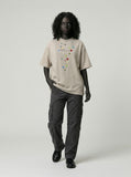 DAXUEN Oversized short-sleeve t-shirt with button graphic — model photo