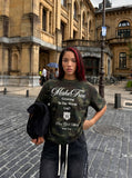 DAXUEN Camo graphic t-shirt with bold text and designs — model photo