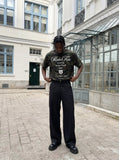 DAXUEN Camo graphic t-shirt with bold text and designs — model photo