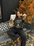 DAXUEN Camouflage graphic crewneck t-shirt — model photo