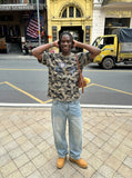 DAXUEN Camouflage graphic t-shirt with polaroid style print — model photo