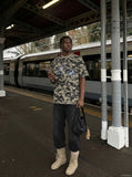 DAXUEN Camouflage graphic t-shirt with polaroid style print — model photo