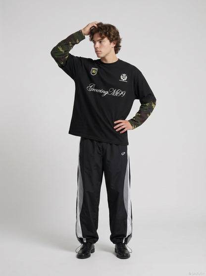 DAXUEN Long-sleeved crew-neck t-shirt with camouflage sleeves — model photo