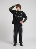 DAXUEN Long-sleeved crew-neck t-shirt with camouflage sleeves — model photo