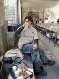 DAXUEN Long-sleeved crew-neck t-shirt with camouflage sleeves — model photo