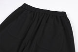 DAXUEN black wide-leg track pants with camouflage and white panels