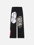 DAXUEN black wide-leg track pants with camouflage and white panels