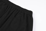 DAXUEN black wide-leg track pants with camouflage and white panels