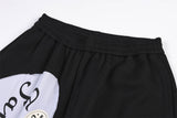DAXUEN black wide-leg track pants with camouflage and white panels
