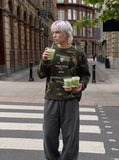 DAXUEN Camouflage long-sleeve top with graphics — model photo