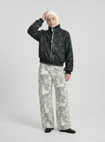 DAXUEN Wide-leg camouflage pants with pockets — model photo