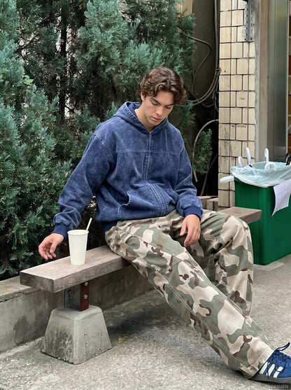 DAXUEN Wide-leg camouflage pants with textured fabric — model photo