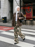 DAXUEN Wide-leg camouflage pants with textured fabric — model photo
