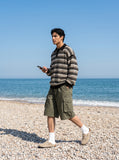 DAXUEN Men's cargo shorts with multiple pockets — model photo
