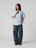 DAXUEN white cartoon animal button short-sleeve shirt — model photo