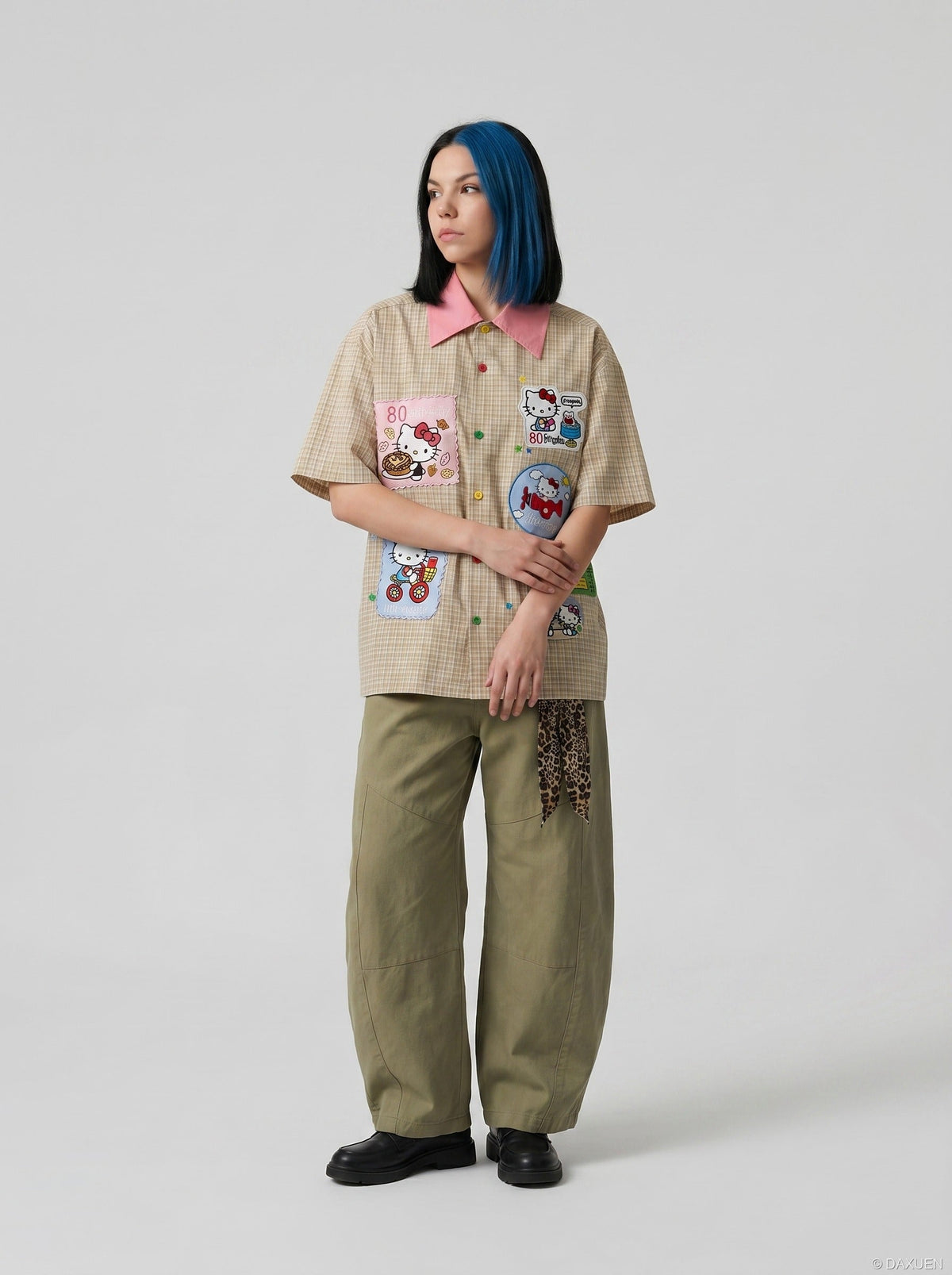 DAXUEN Short-sleeved plaid button-up shirt with cartoon cat patches — model photo